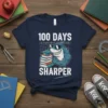 100 Days Sharper t-shirt design with a muscular shark, stack of books, and graduation cap. White text on navy blue