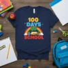 100 Days of School t-shirt design with rainbow, school bus, and books in bright colors