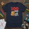 100 Days Of School t-shirt design with a red "100" and "DAYS OF SCHOOL" text above a yellow backpack and