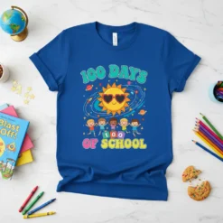 100 Days Of School t-shirt with a smiling sun wearing heart sunglasses and cartoon kids celebrating, in bright colors