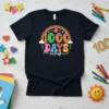 Black t-shirt with colorful "1000 DAYS vibes" text and rainbow graphic, celebrating 1000 days of school