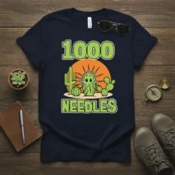 1000 Needles t-shirt design featuring a cartoon cactus with many spines, desert background, and playful typography