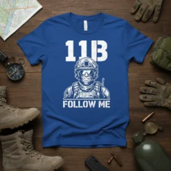 Blue t-shirt with white text "11B FOLLOW ME" and a graphic of a soldier in tactical gear