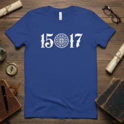 Blue t-shirt with white text "15" and "17" separated by a circular stained-glass window graphic, representing the 1517 Reformation Anniversary