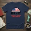 T-shirt with "183 + 67 POWERED BY FREEDOM & BAD MATH." text and American flag graphic, navy blue
