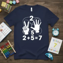 T-shirt with white text and graphics showing '2', '5', and '2 + 5 = 7' equation, with hand gestures for