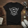 Black t-shirt with a white shield graphic featuring a large number 2 and "EST. 2024" text, 2 EST. 2024