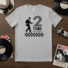 2 Tone Records t-shirt design with a ska dancer, the number 2, and checkerboard pattern