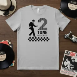 2 Tone Records t-shirt design with a ska dancer, the number 2, and checkerboard pattern