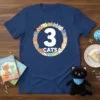 Navy blue t-shirt featuring the text "3 CATS" surrounded by a circle of cute cartoon cats