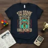 4th Grade Unlocked Level Up T-Shirt with a video game castle graphic and controller