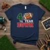Navy t-shirt with "4TH YEAR DOWN" text and football graphic. Design is for football fans celebrating a milestone