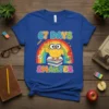 67 Days Smarter t-shirt with a cute owl on a rainbow, holding a peace sign and sitting on books