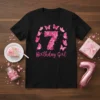 Black t-shirt with "7 Birthday Girl" text and pink floral number 7 surrounded by butterflies, perfect for a 7th birthday