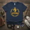 Navy blue t-shirt with gold "7 LEGEND" text and crown graphic, celebrating a 7th birthday