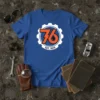 76 Est 1976 vintage logo on a blue t-shirt, featuring a gear graphic and orange numbers