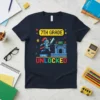 7th Grade Level Unlocked t-shirt featuring pixel art knight, castle, and text