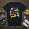 80's Baby 90's Made Me graphic t-shirt featuring retro icons and bold typography