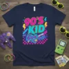 90'S KID text with retro boombox and cassette tape graphic on a navy blue t-shirt