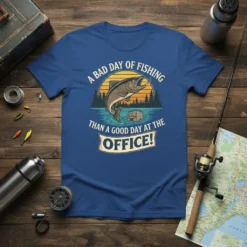 A Bad Day of Fishing Than a Good Day at the Office! quote on a blue t-shirt with a jumping