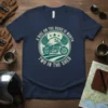 A Bike On The Road Is Worth Two In The Shed motorcycle quote t-shirt with a vintage-style bike and wings