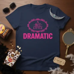 Navy t-shirt with pink text "A Bit Little Dramatic" inside an ornate oval frame
