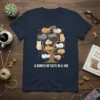 A Bunch of Cats in a Jar T-Shirt design featuring a tree filled with sleeping cats in various colors and
