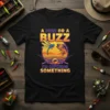 T-shirt with "A Fish Or A Buzz I'm Catching Something" text, dragonfly, fish, and fishing rods graphic