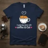 A good day starts with coffee & Cat T-Shirt featuring a cute cat sleeping in a coffee cup with paw