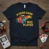 A Good Game Was Played retro arcade machine graphic on a navy t-shirt, celebrating classic video games