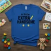 Blue t-shirt with black text "A little EXTRA HANDSOME" and a yellow and blue awareness ribbon. Includes blue and yellow