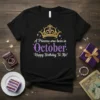 Black t-shirt with gold crown and purple text saying "A Princess was born in October Happy Birthday To Me!"