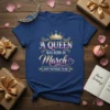 A QUEEN WAS BORN IN March HAPPY BIRTHDAY TO ME text design with crown graphic on a blue t-shirt