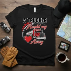 A TRUCKER Hauld my Away text with a red semi-truck and hearts design on a black t-shirt