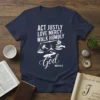 Navy blue t-shirt featuring white text "Act Justly Love Mercy Walk Humbly God Micah 6:8" with scales of justice, gavel