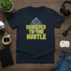 Addicted To The Hustle quote on a navy t-shirt with stylized industrial graphics