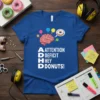 ADHD ATTENTION DEFICIT HEY DONUTS! text with brain and donut graphic on a royal blue t-shirt
