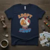 Adopt Don't Shop t-shirt with graphic of dog, cat, and rabbit inside a circle, promoting pet adoption