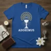 Adoremus Christian faith t-shirt featuring a chalice and IHS symbol, designed for religious wear