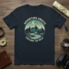 Adventure Awaits Explore The Wild t-shirt with mountain river graphic and crescent moon, vintage outdoor theme