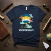 Navy t-shirt with "Adventure Awaits" text and a colorful hot air balloon graphic, clouds, and stars