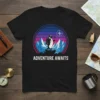 Adventure Awaits t-shirt design featuring a penguin with a backpack standing on a mountain peak, with a compass and sunset