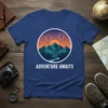 Adventure Awaits T-Shirt featuring a circular graphic of mountains, hot air balloons, and a river at sunset