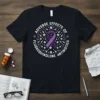 T-shirt design featuring a purple awareness ribbon surrounded by pills, displaying text "Adverse Effects of Fluoroquinolone Antibiotics"