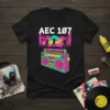 Black t-shirt with "AEC 1Ø7" text above a retro boombox graphic and a vibrant sunset skyline with palm trees