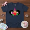 Afro unicorn girl face graphic with a crown, pink ears, red flower, and black afro hairstyle on a navy t-shirt