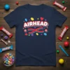 Navy t-shirt featuring the word "AIRHEAD" in bold white letters with a red outline, surrounded by colorful candy graphics like