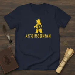 Navy t-shirt with a yellow Aitchisonian bear crest design, featuring a bear holding a shield and wearing a crown