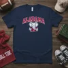 Navy blue t-shirt featuring the Alabama Crimson Tide elephant mascot with "ALABAMA" text above, holding a football