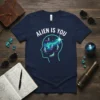 T-shirt featuring the text "ALIEN IS YOU" above a silhouette of a head filled with colorful nebulae and small figures
